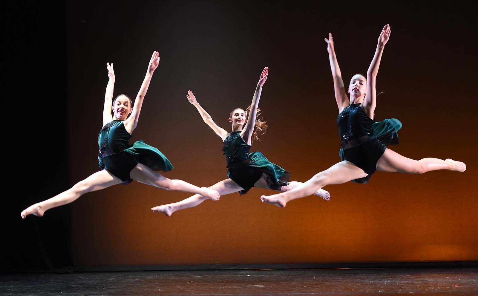 Performance group dancers on stage